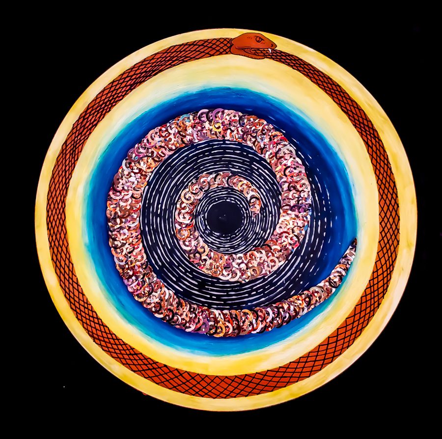 A circular picture of the center of a painting.